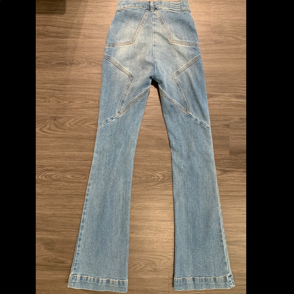 REVICE DENIM VENUS FLARE JEANS.